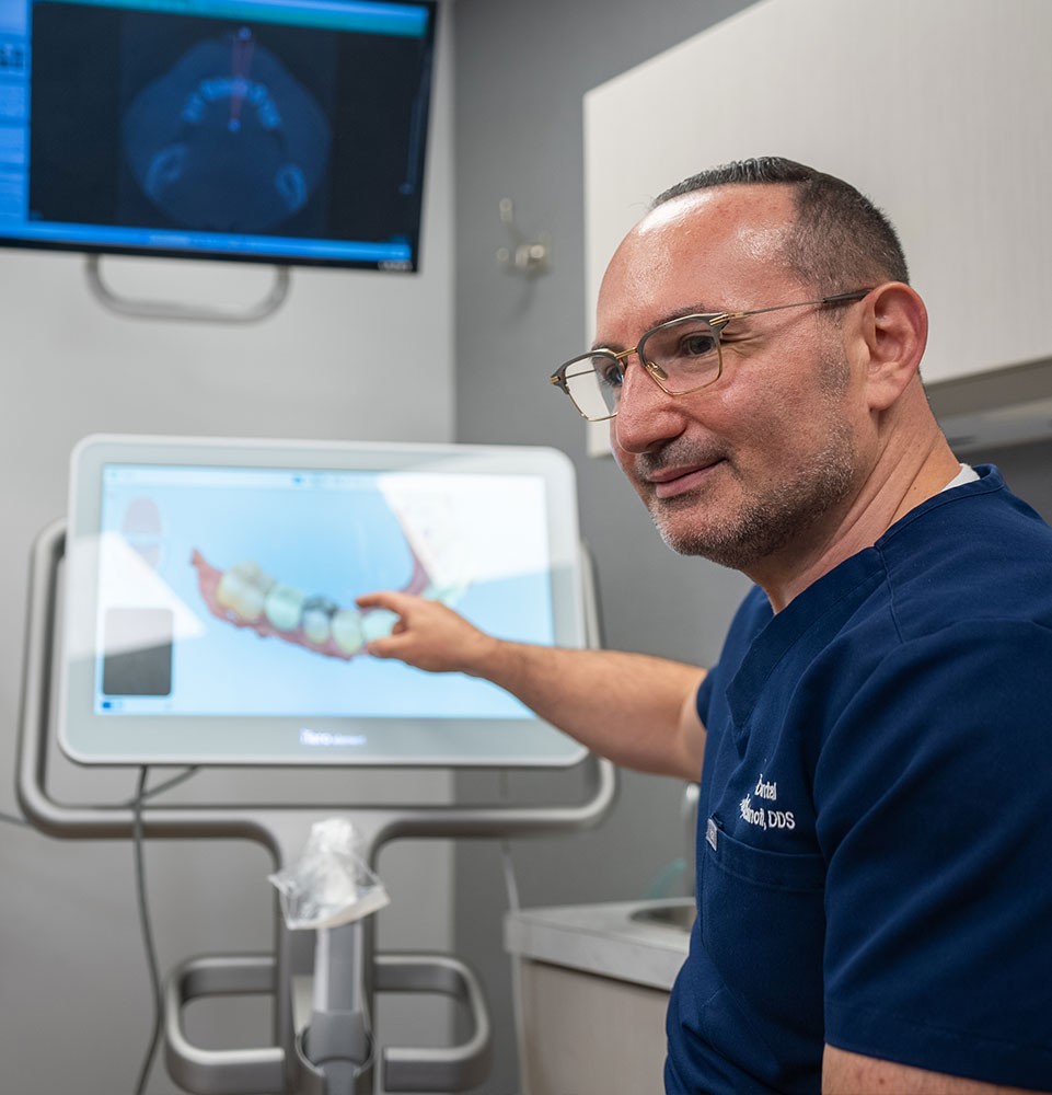 Doctor showing information on a screen